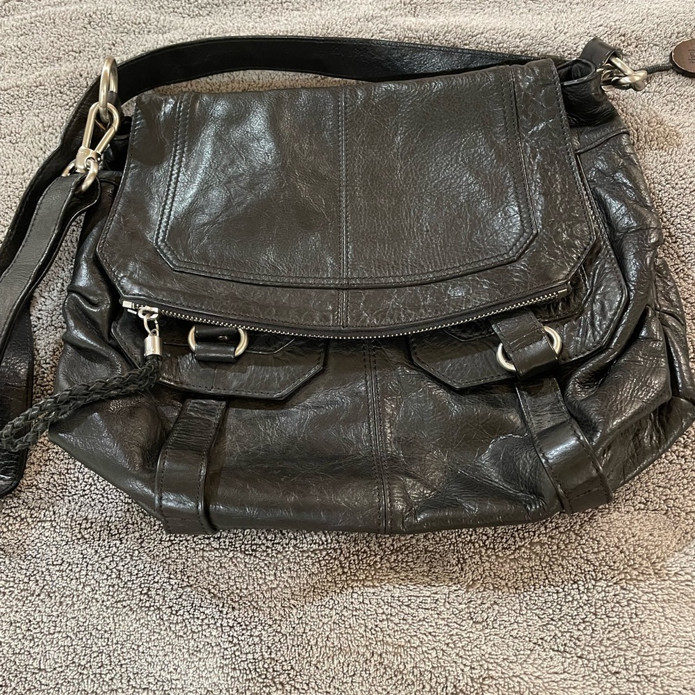 Excellent Condition, Crossbody one owner not a backpack used a couple times.